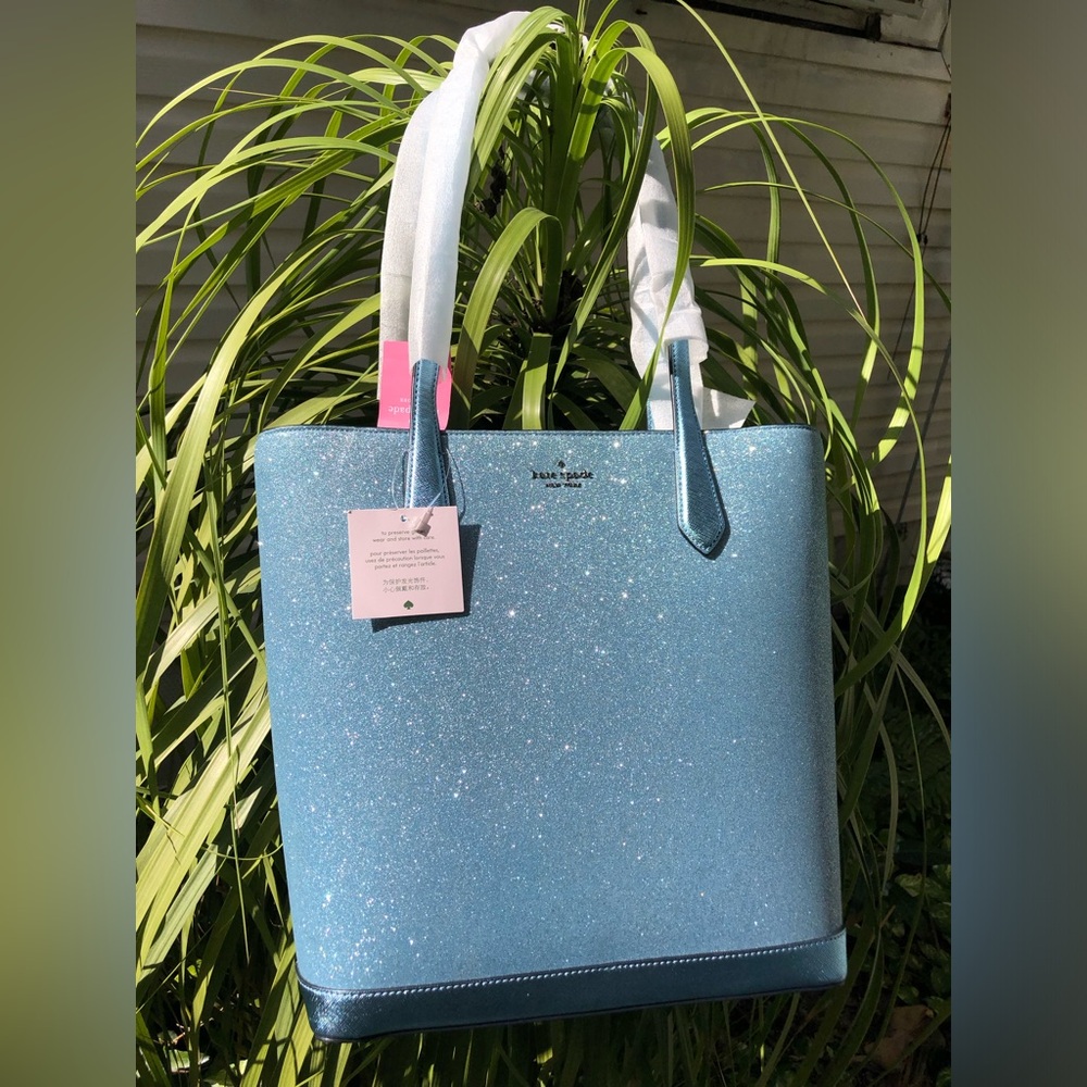 Kate Spade glittery large turquoise blue NWT bag. Comparable value $429. See tag